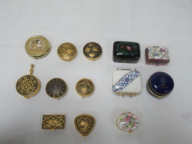 Null Set of 11 metal and porcelain pillboxes. 4 cm
