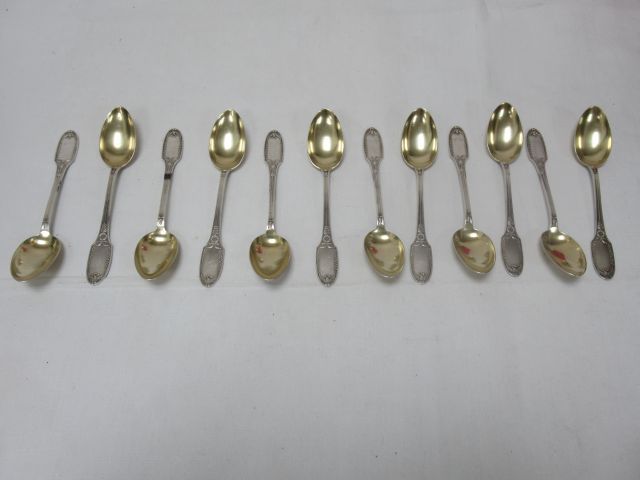 Null Suite of 12 small silver and vermeil spoons. Minerva. Weight : 205 g