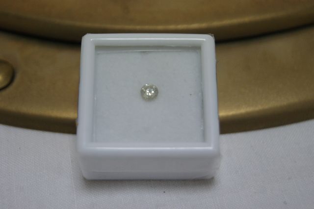 Null Diamond under seal on paper of 0.22 carat.

Accompanied by its IGR certific&hellip;
