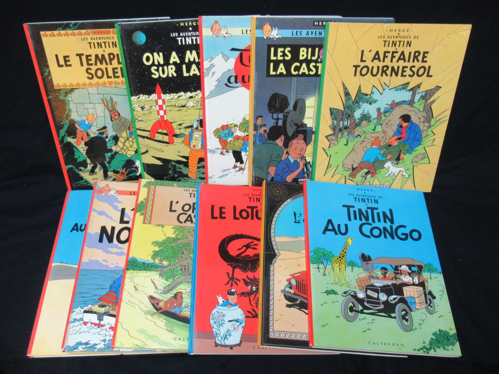Null Set of 11 "TINTIN" comics, including "The Temple of the Sun", "We walked on&hellip;