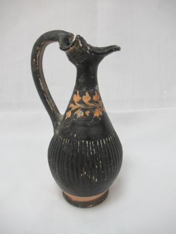 Null Black ceramic oenoeche, with trefoil spout. Fluted body decorated with a fr&hellip;