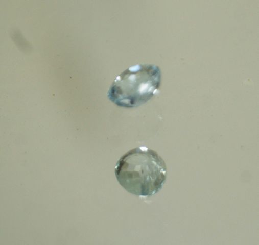 Null Oval aquamarine on paper.

Weight : 1,36 ct approx.