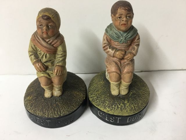 Null Amusing pair of painted terracotta figures of children "C'est dur" and "C'e&hellip;