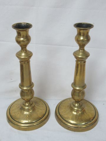 Null ORIENT Pair of candlesticks in gilt metal. Height: 28 cm