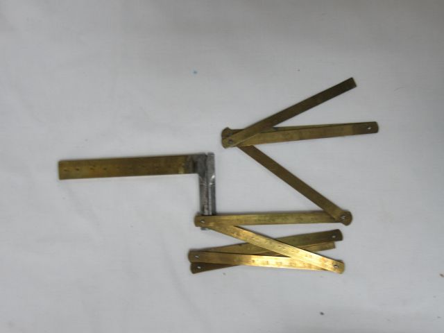 Null 金属和黄铜套装，包括一个卡尺和一个折叠尺。20世纪初。10-11厘米