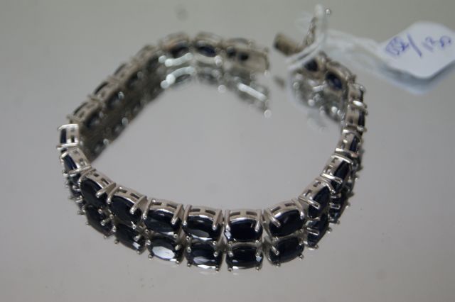 Null Silver bracelet, set with sapphires (20 carats in all). Gross weight : 21,6&hellip;