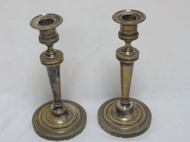 Null A pair of silver plated candlesticks. Height: 20 cm (unsilvered).