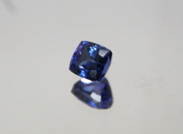 Null Beautiful tanzanite of size cushion. 

Accompanied by an AIG certificate at&hellip;