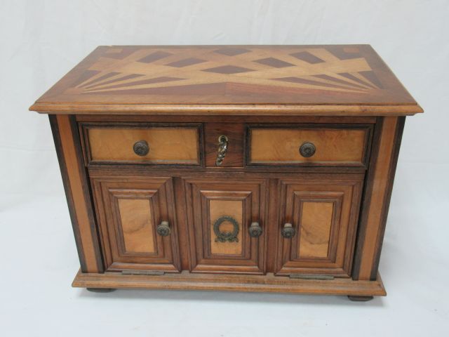 Null Small piece of furniture in inlaid wood, opening with a drawer and a flap. &hellip;