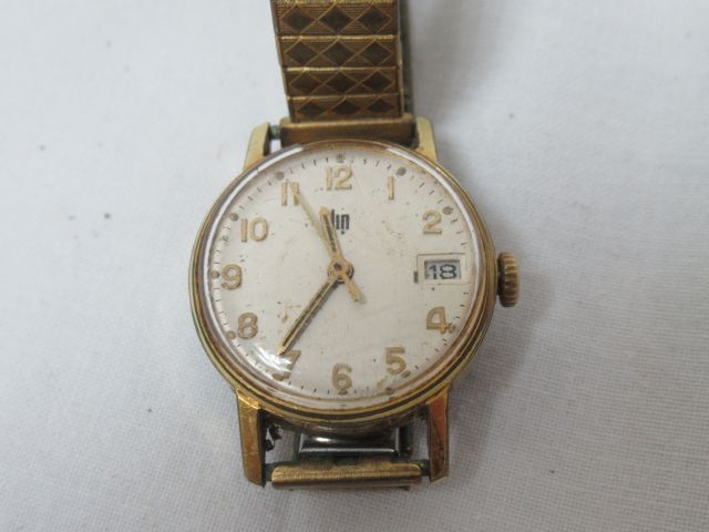 Null LIP Ladies' watch in gilt metal. Mechanical movement. (wear)