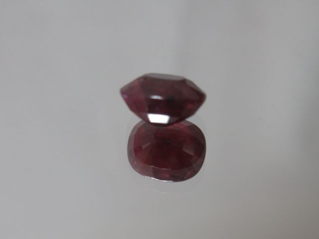 Null Cushion cut ruby on paper

Weight: 3,43 cts approx