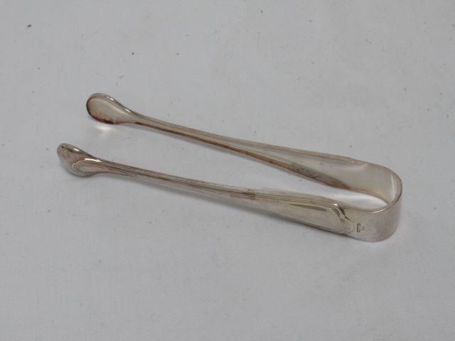 Null CHRISTOFLE, silver plated sugar tongs.