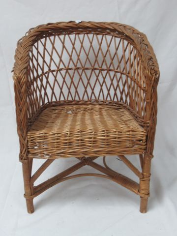Null Child's armchair in rattan. Height: 46 cm (wear on the seat)