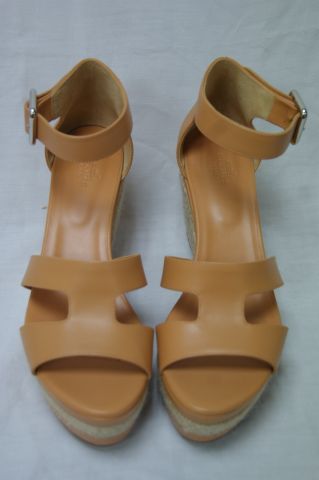 Null HERMES Pair of sandals in tobacco leather, wedge soles. Size 38. Near mint &hellip;
