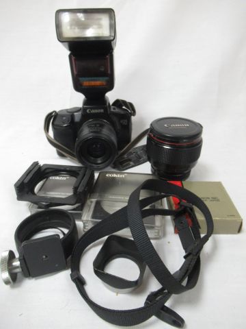 Null CANON EOS 750相机与EF 35 - 70 mm 1: 3.5 - 4.5镜头，一个闪光灯，一个FD 85 mm 1: 1.2镜头和杂物。一&hellip;