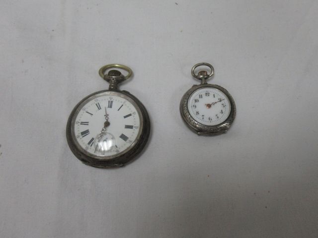 Null Lot including a silver pocket watch and a silver collar watch. Gross weight&hellip;