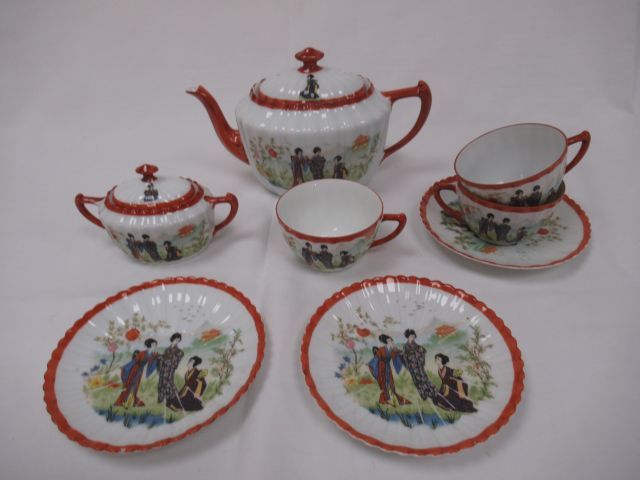 Null 日本瓷器服务套装，包括一个茶壶，一个糖碗，三个杯子，三个茶碟。