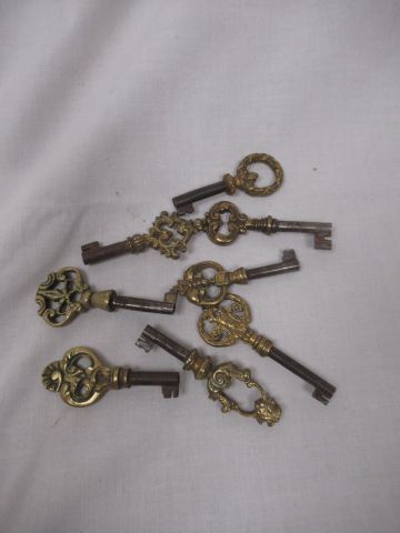 Null Lot de clefs en bronze. Pour meubles, XVIIIe et XIXe.