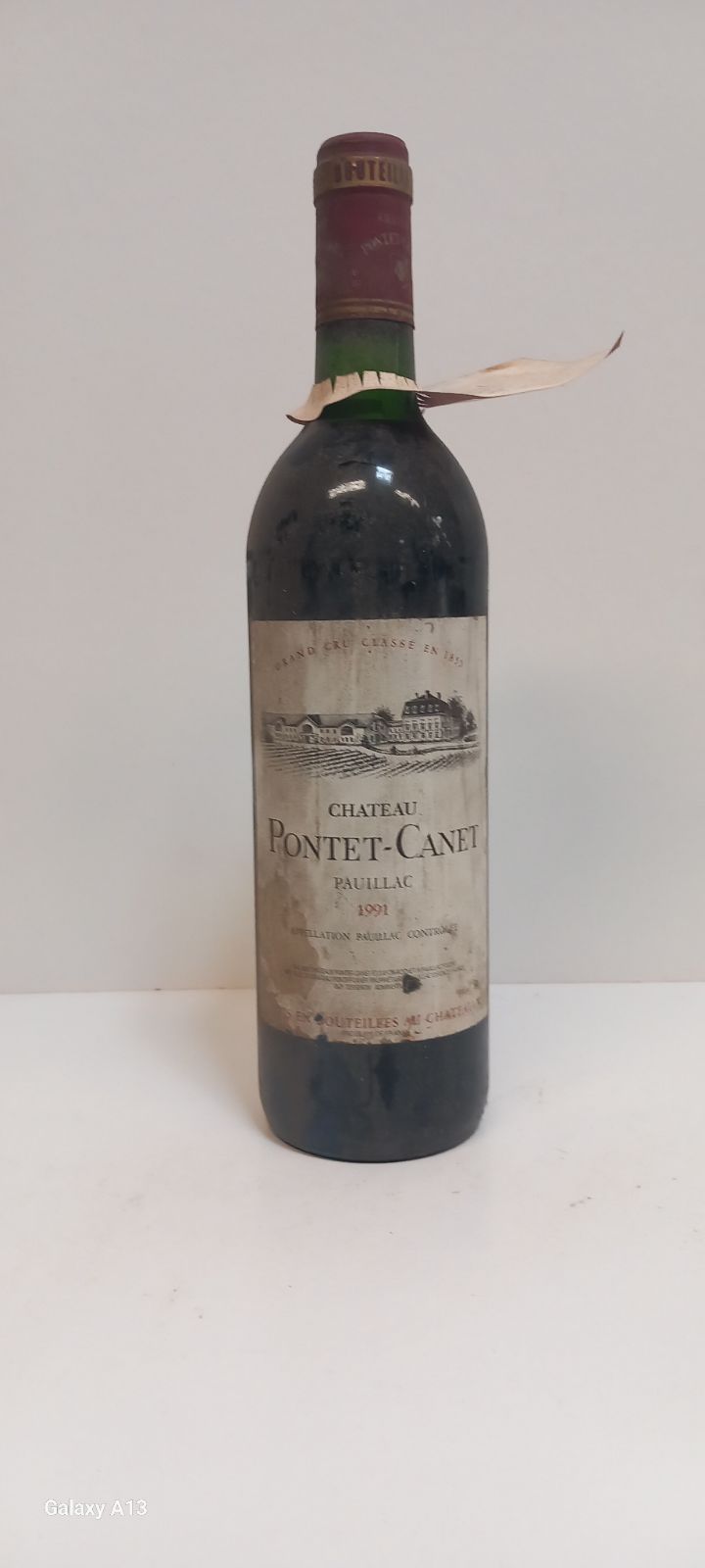 Null Bottle of Château Pontet- Canet 1991 5th Grand Cru Classé Pauillac (dirty b&hellip;
