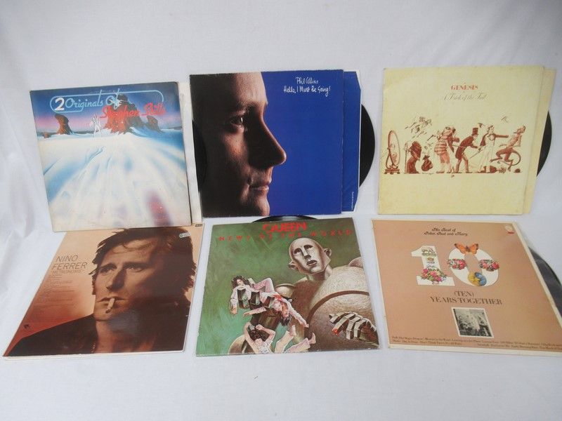 Null Lot de 6 vinyles 33 tours dont Phil Collins,
Métronome et Queen. Usures au &hellip;
