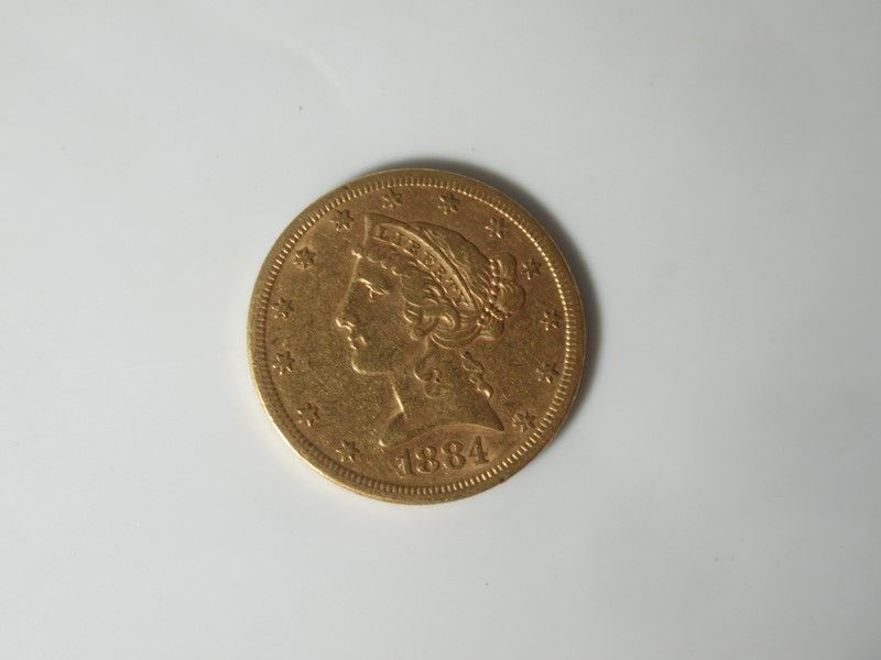 Null 5 美元硬币，1884 年。重量：8.34 克