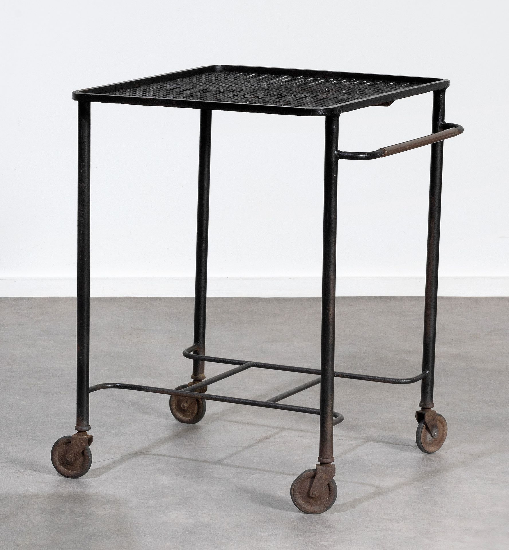 Mathieu MATÉGOT (1910-2001) Television table with wheels.
Black lacquered perfor&hellip;