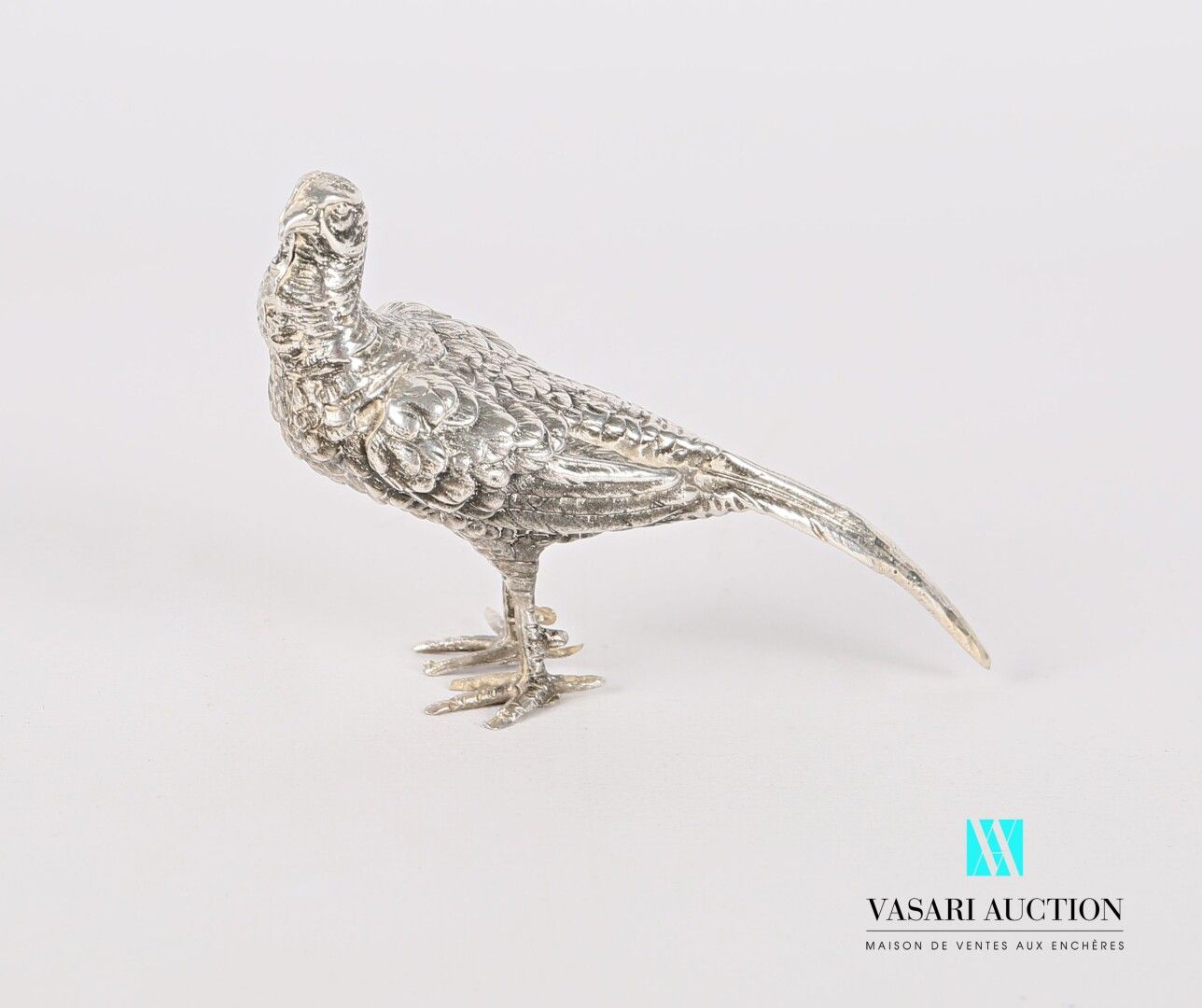 Null Silver subject representing a pheasant

Weight : 119,59 g - Height : 5,5 cm&hellip;