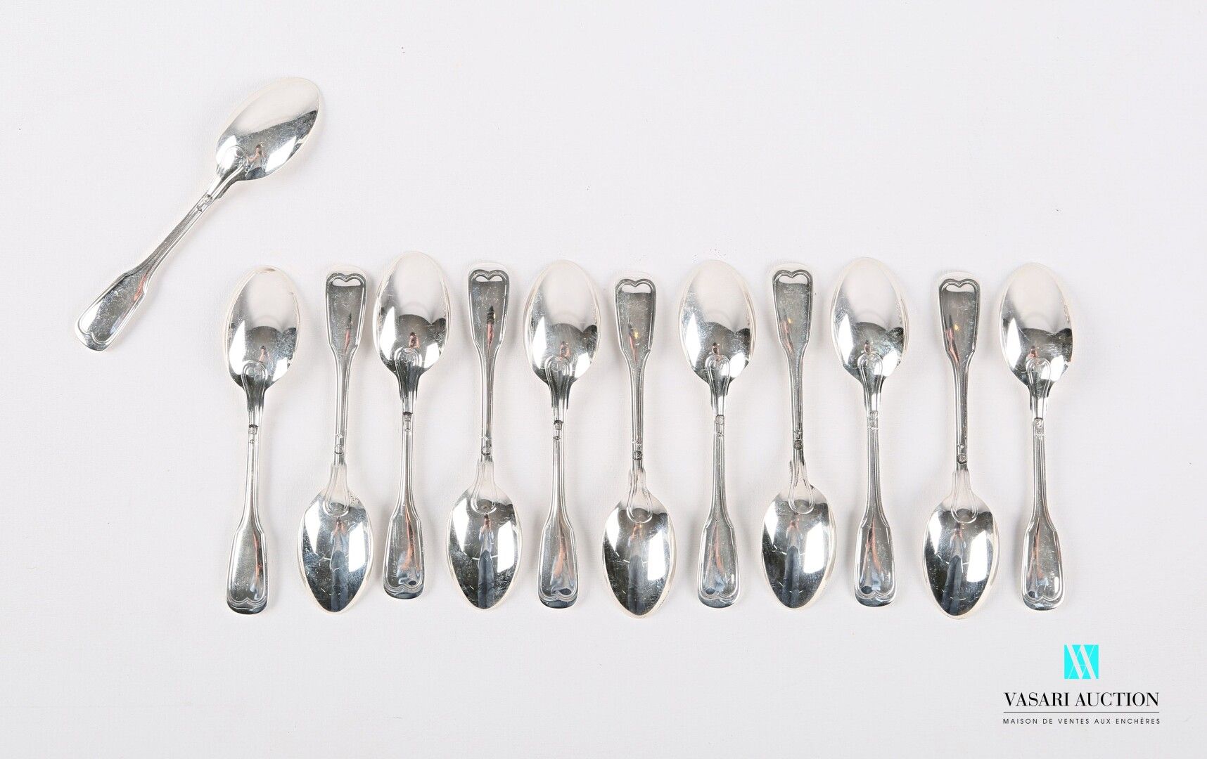 Null Set of twelve silver mocha spoons, the handle decorated with filets.

Weigh&hellip;