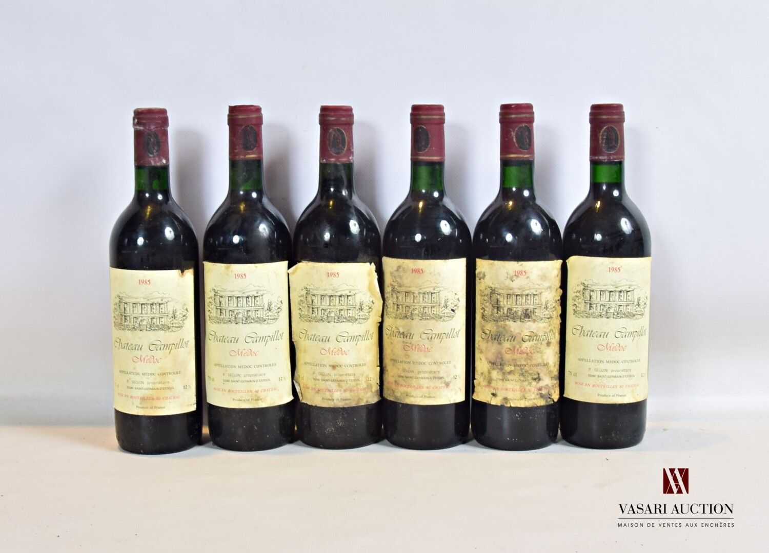Null 6 botellas Château CAMPILLOT Médoc 1985

	Et: 3 manchados (1 desgarro), 2 m&hellip;