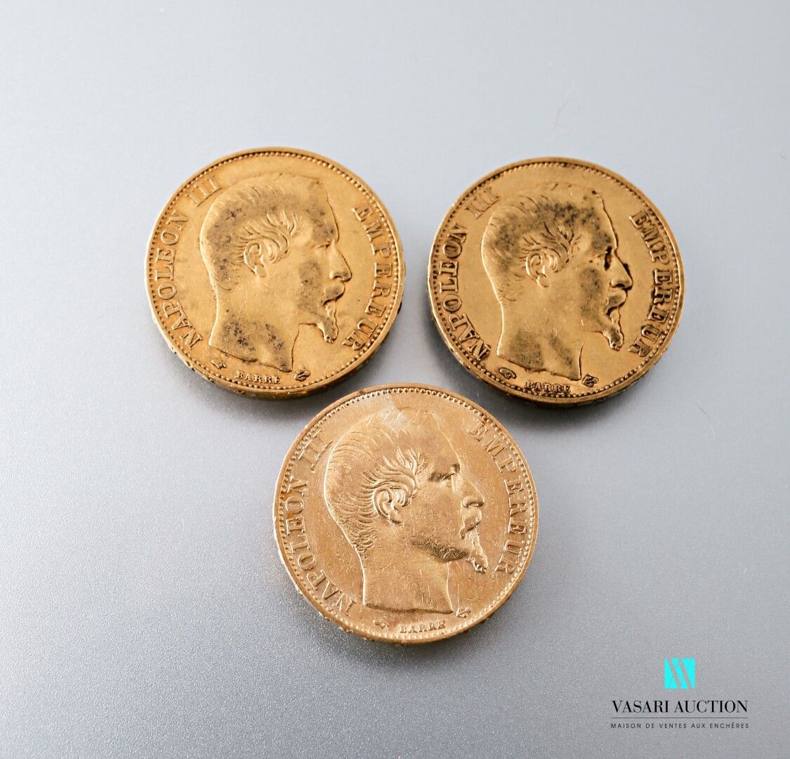 Null 三枚显示拿破仑三世光头的20法郎金币，由Albert-Désiré Barre刻制，1857年，A工作室（巴黎）。

重量 : 19,21 g