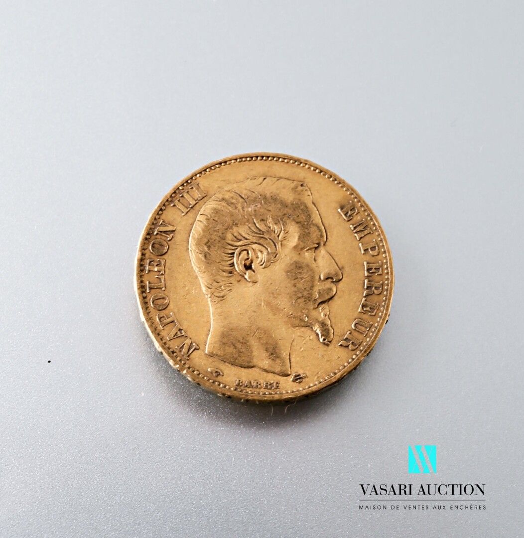 Null 一枚显示拿破仑三世光头的20法郎金币，由Albert-Désiré Barre刻制，1856年，A工作室（巴黎）。

重量 : 6,40 g