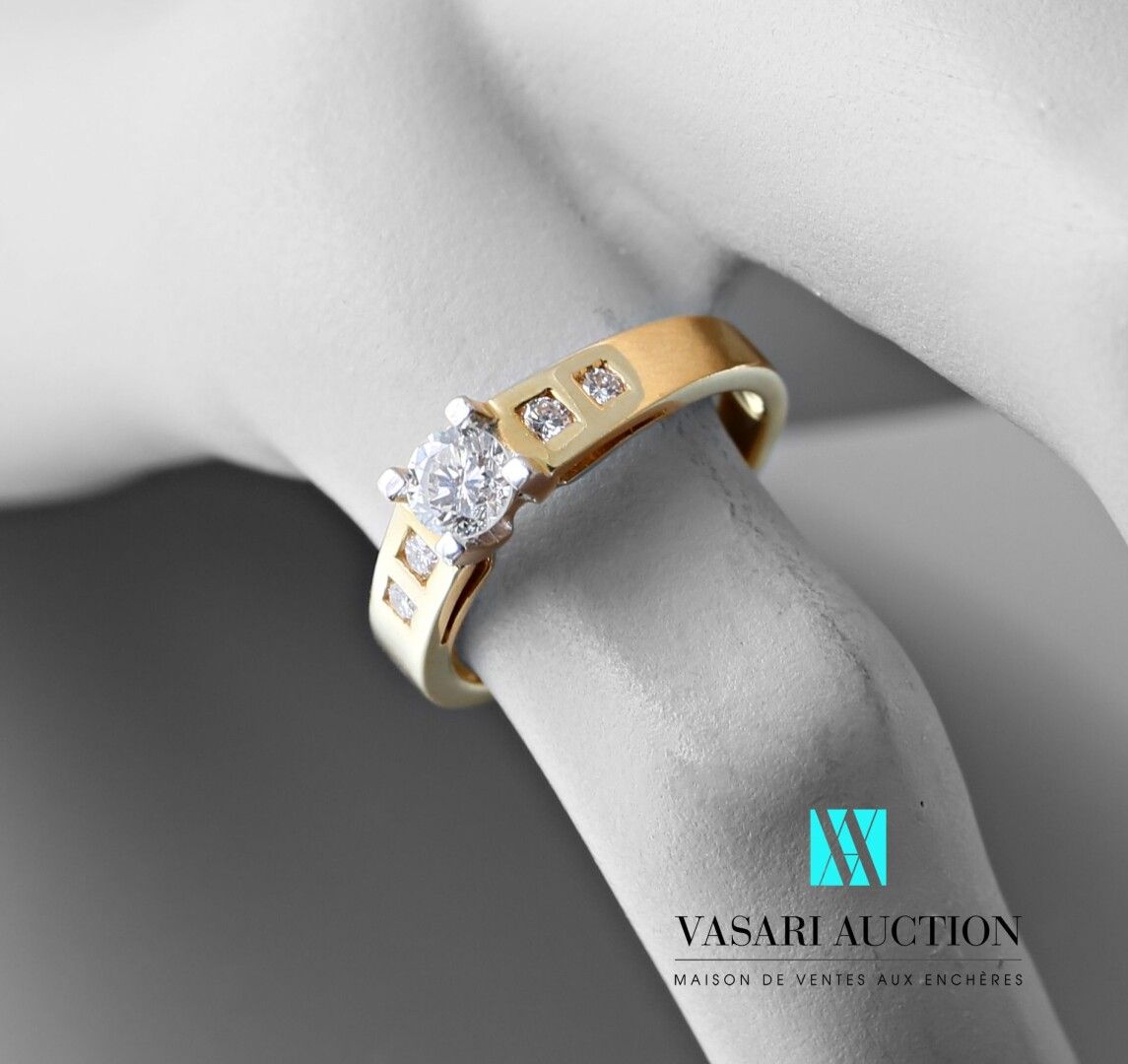 Null Ring in yellow gold 750 thousandths, flat ring set with five diamonds, the &hellip;