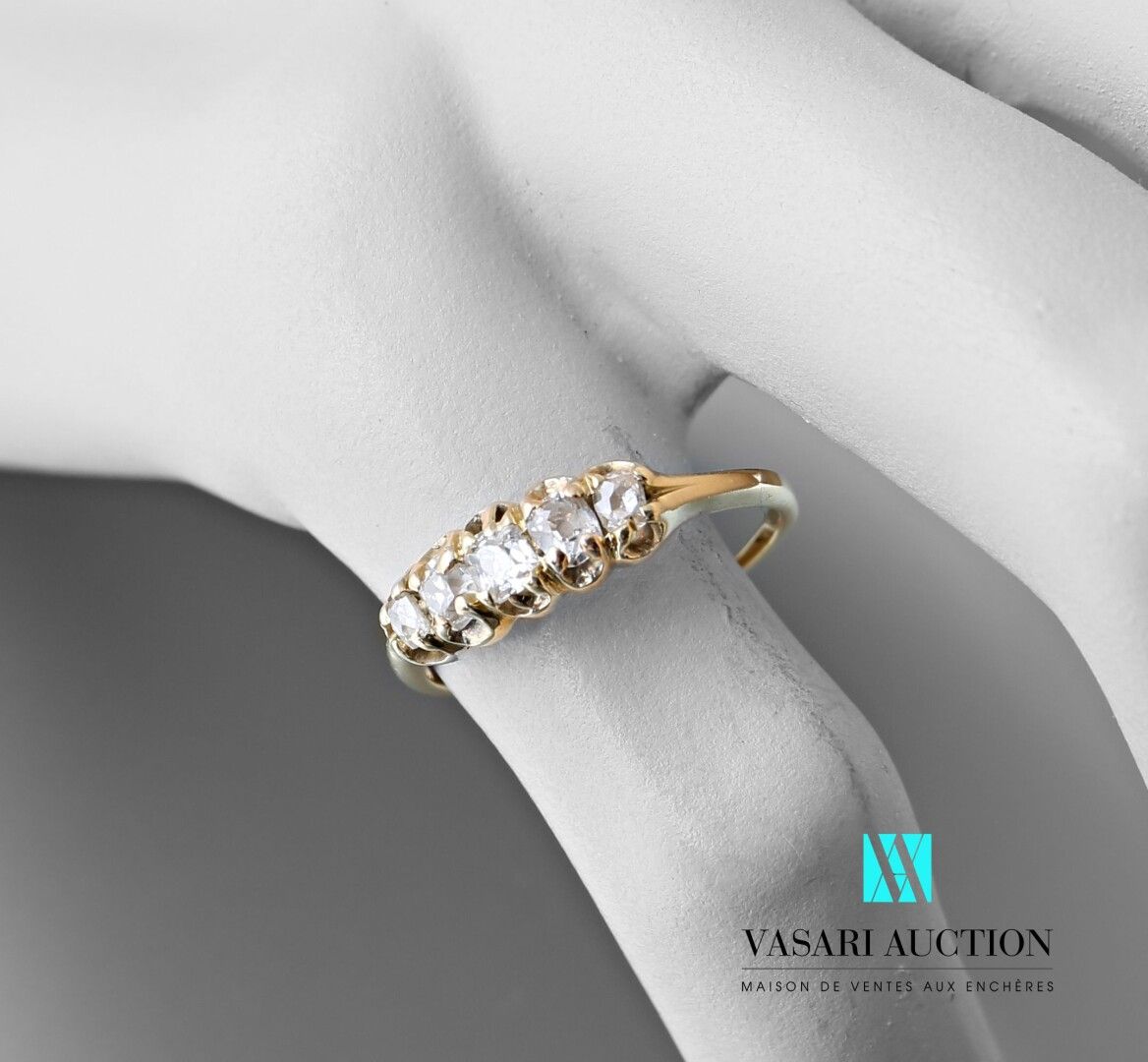 Null Half ring in yellow gold 750 thousandth set with five old cut diamonds 

Gr&hellip;