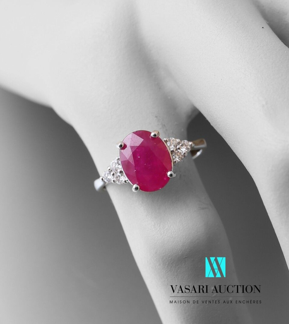 Null Ring in white gold 750 thousandth set in its center of a ruby of oval size &hellip;