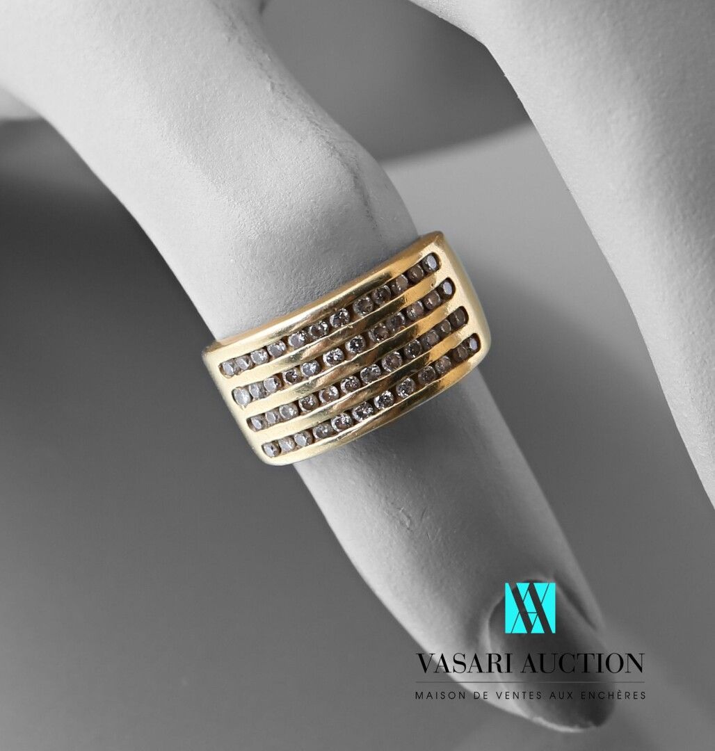 Null Ring in yellow gold 750 thousandths: large ring set with four rows of small&hellip;