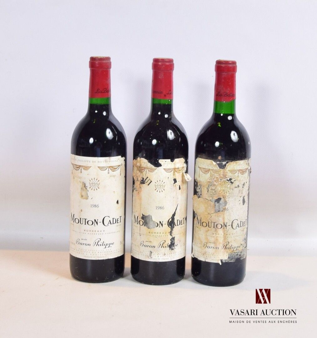 Null 3 bouteilles	MOUTON CADET	Bordeaux mise nég.	1986

	Et.: 1 tachée et légère&hellip;