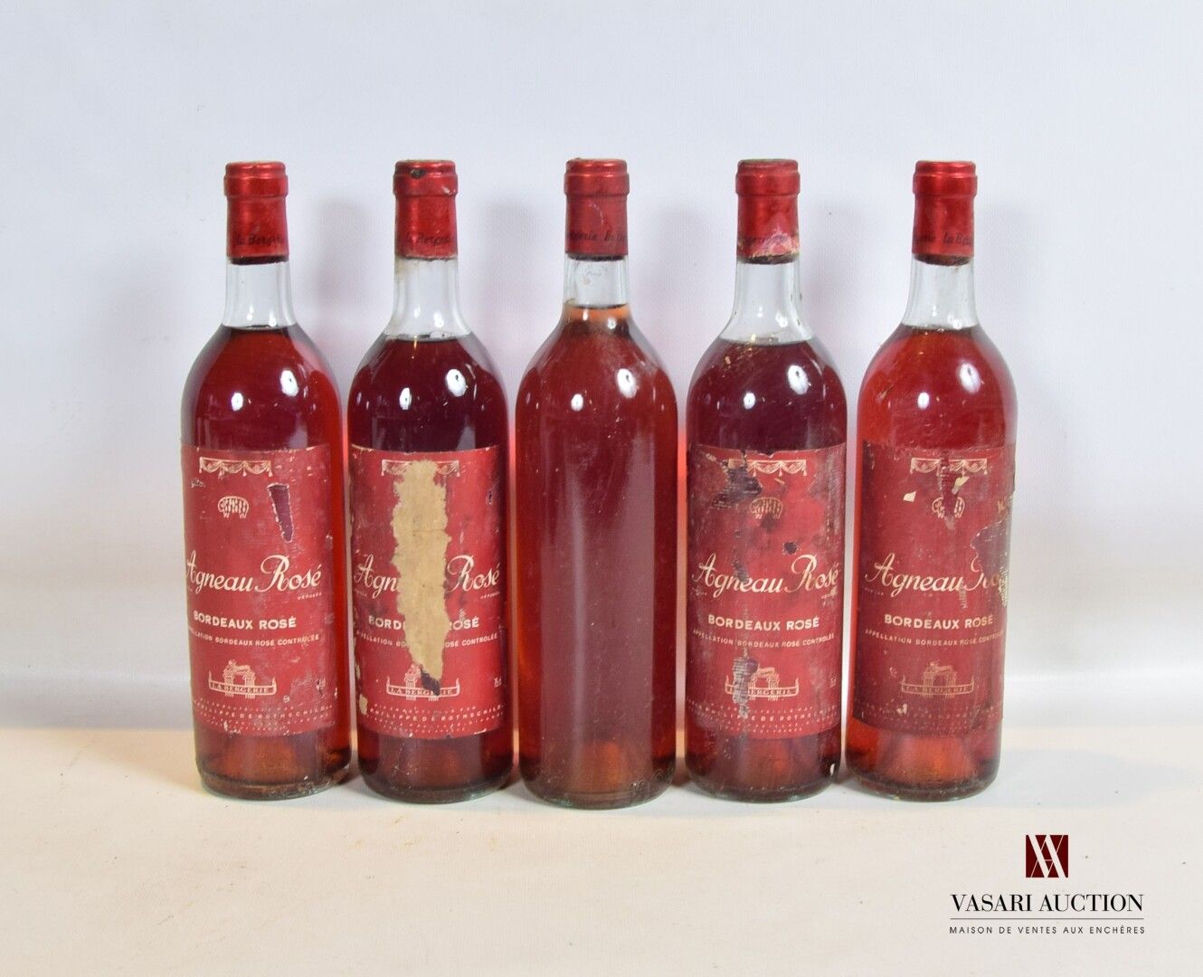 Null 5 bottles ROSED LAMB Bordeaux rosé neg.

	S: 4 faded and stained, 1 missing&hellip;