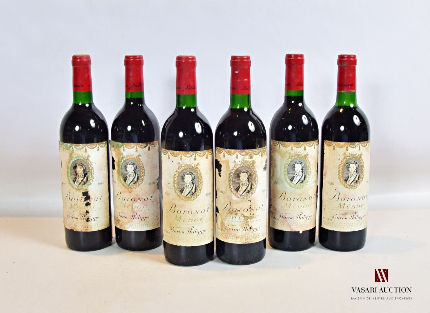 Null 6 bottles BARONAT Medoc 1986

	Faded, stained and torn (fragile). N: 2 half&hellip;