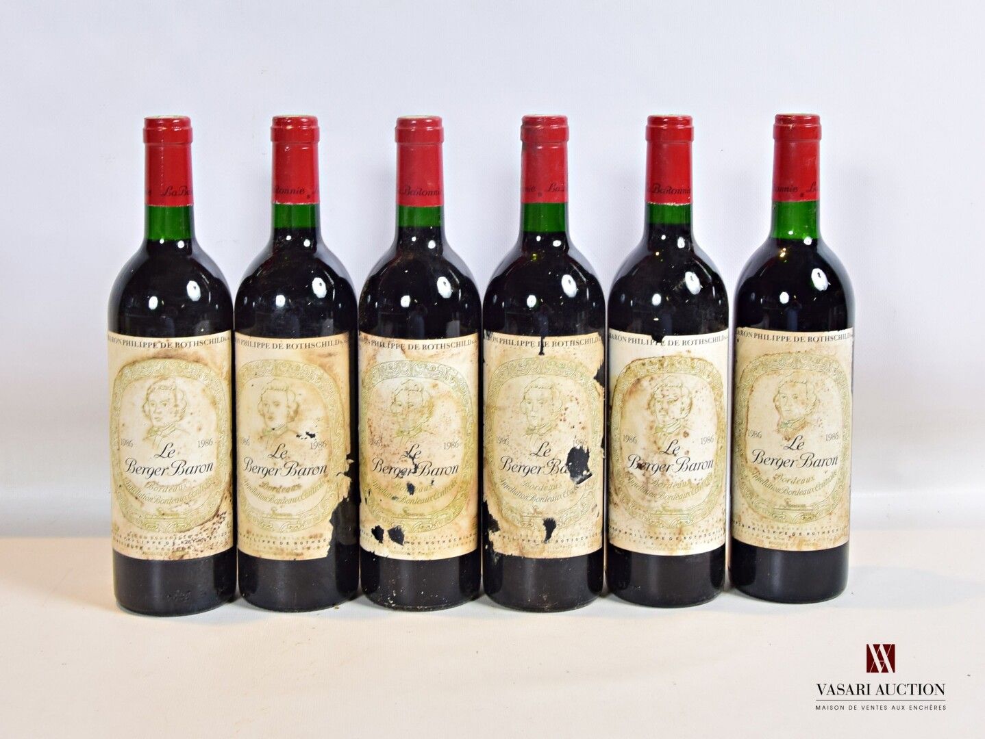 Null 6 bouteilles	LE BERGER BARON	Bordeaux mise nég.	1986

	Et. Fanées et tachée&hellip;