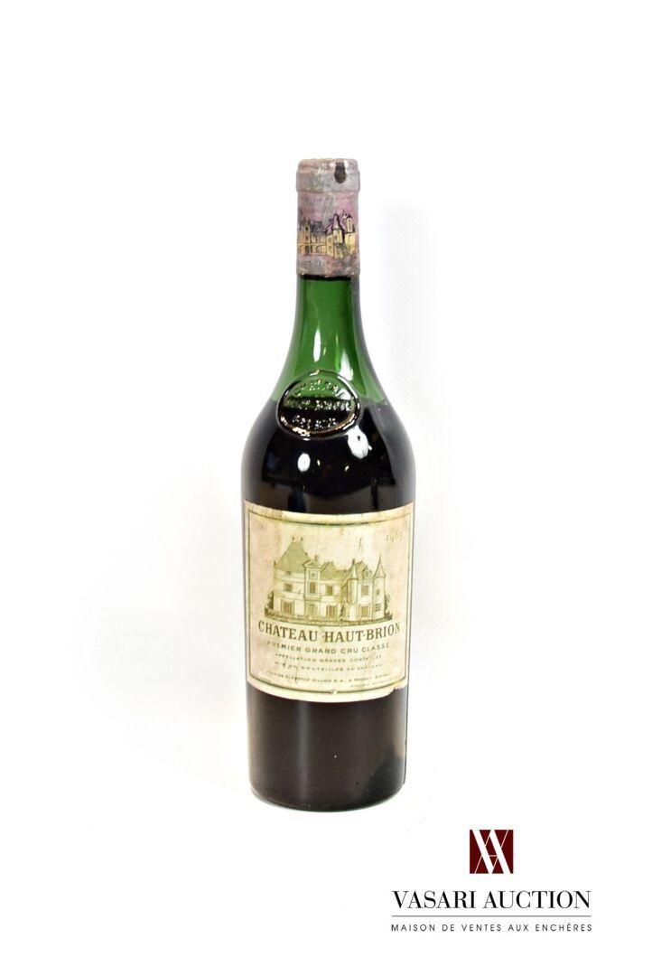 Null 1 Flasche Château HAUT BRION Graves 1er GCC 1965.

	Et. Verblasst, fleckig &hellip;