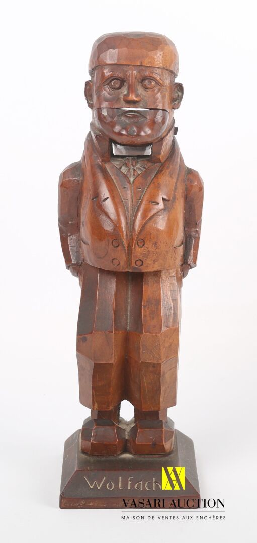 Null Carved wooden nutcracker representing a man wearing a vest marked "Wolfach"&hellip;