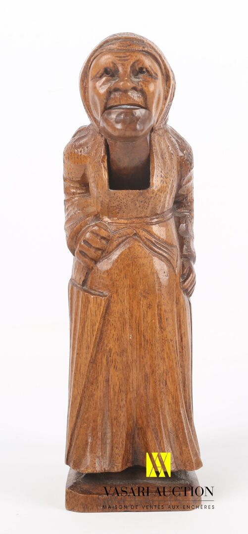 Null 雕刻的木制胡桃夹子，以一个撑伞的老太太为主题

背面的标签：圣克劳德文章

汝拉工作

高度：20厘米高度：20厘米
