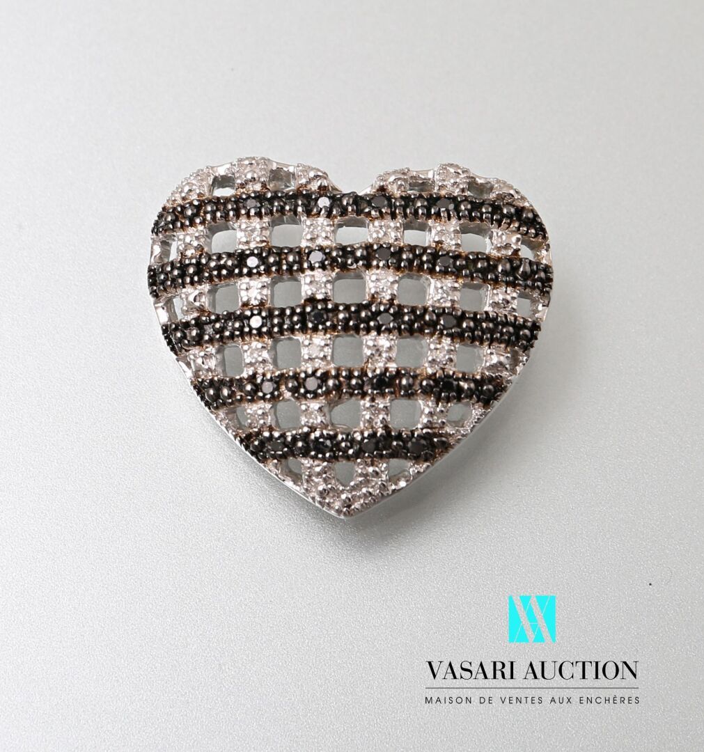 Null Silver heart pendant with a latticework of black diamonds and zircons.

Gro&hellip;