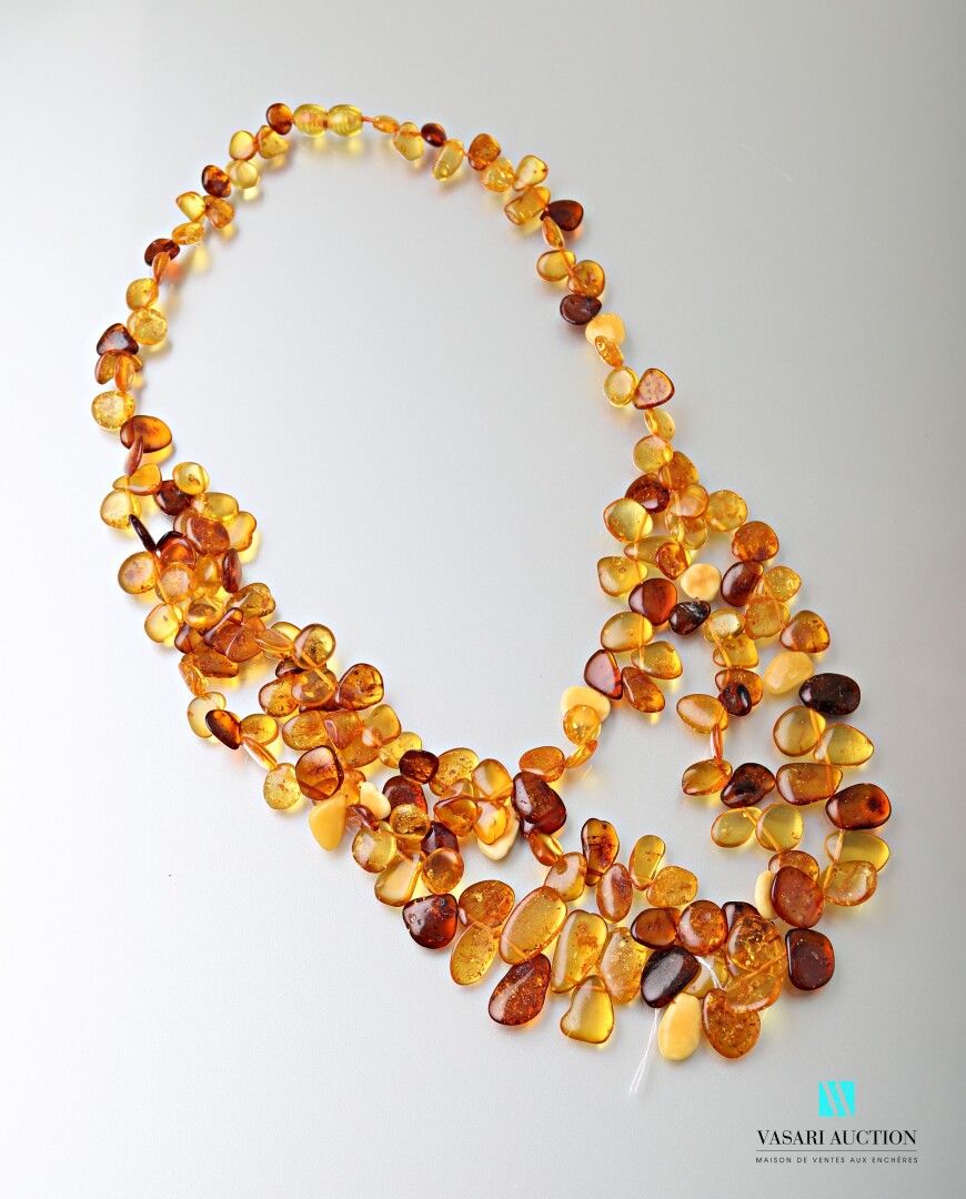 Null Necklace drapery with three rows of amber pellets, screw clasp.