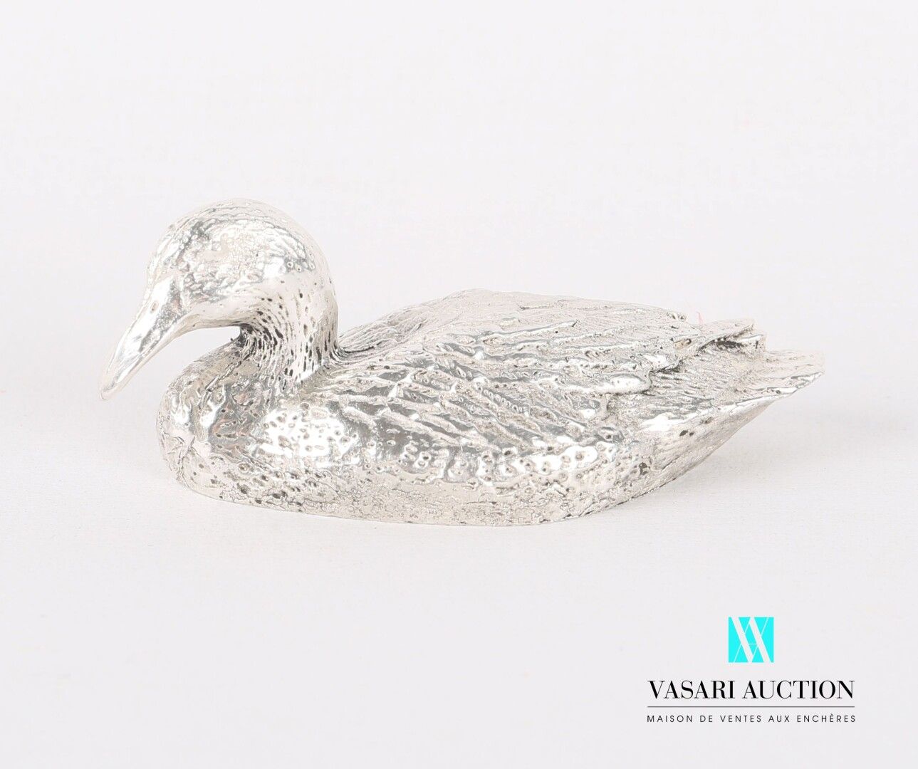 Null Silbernes Sujet, das eine Ente darstellt.

Gewicht: 136,80 g - Länge: 6,5 c&hellip;