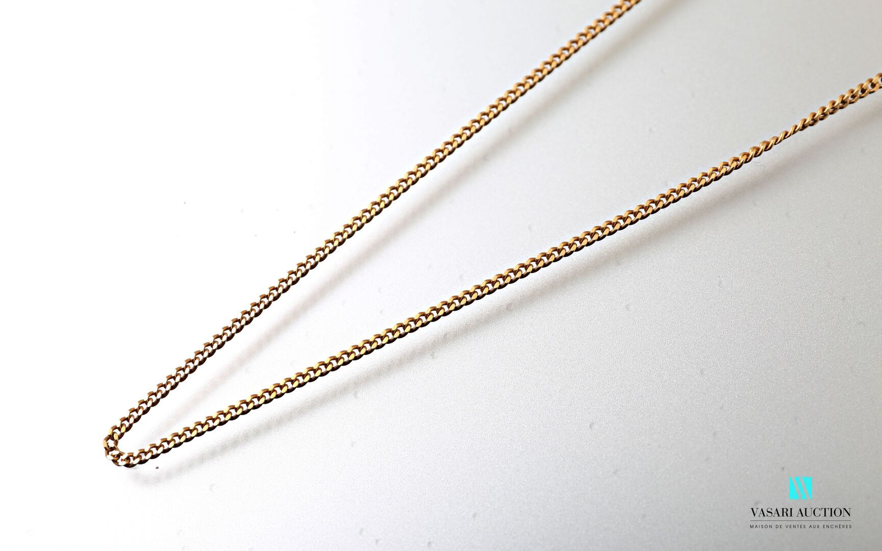 Null Chain in yellow gold 750 thousandths mesh gourmette 5.6 g. Length 49,5 cm.