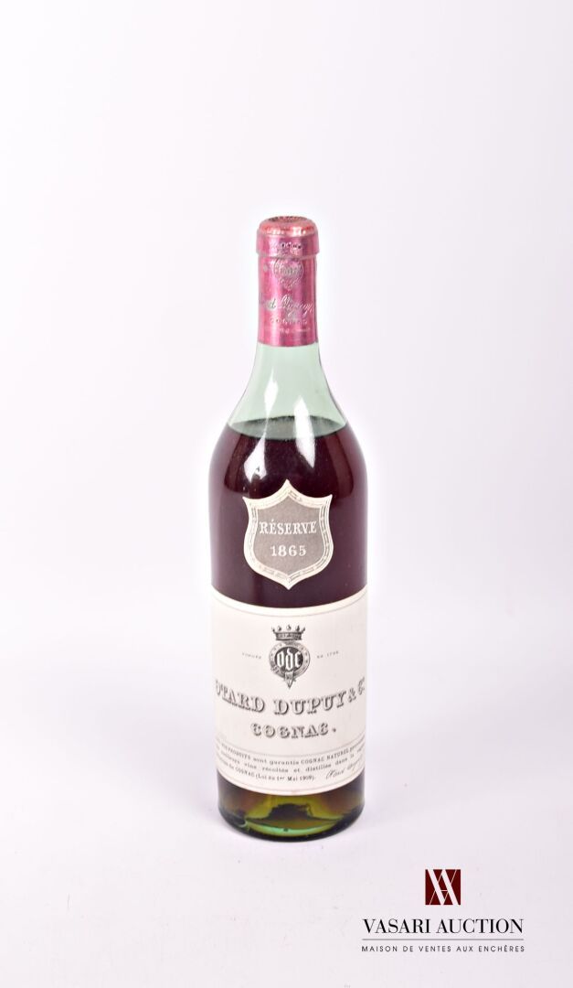 Null 1 botella de coñac OTARD DUPUY & C° Réserve 1865
	Y. Ligeramente manchada. &hellip;