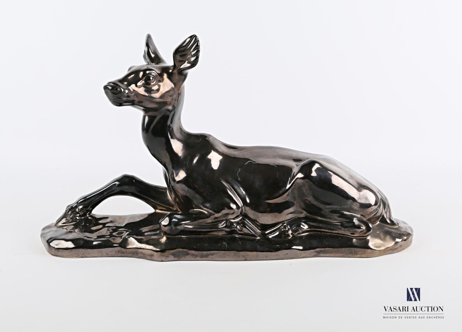 Null BONOME Santiago Rodriguez (1901-1995) 
Reclining deer in lustrous earthenwa&hellip;