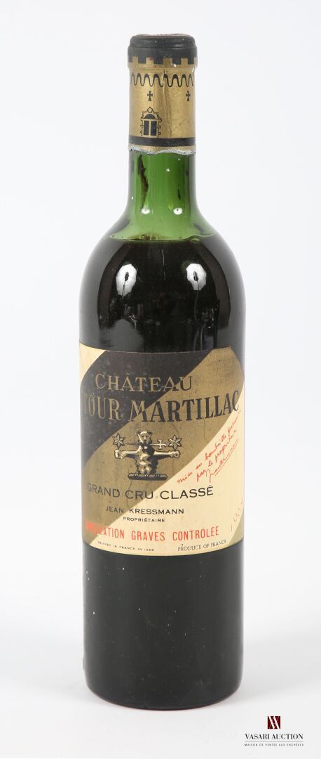 Null 1 bouteille	Château LATOUR MARTILLAC	Graves GCC	1964
	Et. Un peu fanée et t&hellip;