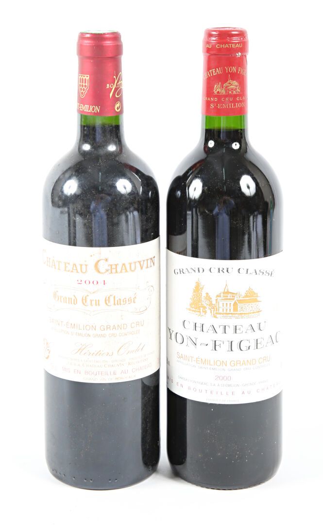 Null Lot of 2 bottles including :
1 bottle Château CHAUVIN St Emilion GCC 2004
1&hellip;